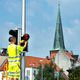 A technician replaces one of many pedestrian signals featuring Vikings in Aarhus, Denmark on Aug 26.